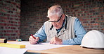 Mature, architect and writing with blueprint on construction site for planning or building design. Male person, contractor or civil engineer with document or floor layout for PPE, safety or security