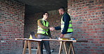Handshake, discussion and construction workers on site with partnership, agreement or maintenance deal. Meeting, men and contractor shaking hands with civil engineer for building or industry project.