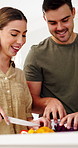 Smile, couple and vegetables in home for cooking, meal prep and healthy food for vegan lunch. Happy, people and cutting in kitchen with organic ingredients, culinary skills and recipe for diet salad