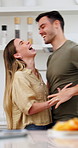 Love, dancing or couple in home with fun, romantic moment or bonding together on weekend break. Partner, groove or people in kitchen with laugh, rhythm or playful connection in happy relationship.