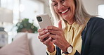 Phone, typing and old woman in home with laugh, funny retirement joke and browsing social media app. Flare, happy and senior person in living room with tech, text message and humor for online meme.
