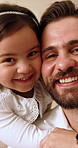 Face, father and kid in home with hug, love and parental affection for bonding together. Portrait, man and embrace in living room with daughter, family connection and development for weekend break
