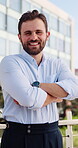 Happy, face and businessman with arms crossed in city, laugh or real estate agent with career growth. Outdoor, realtor and person with smile for property investment, confident and opportunity in USA