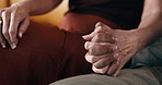 Holding hands, support and couple in home for relax, comfort or bonding in marriage together. Commitment, trust and man with woman for relationship connection, safety or love in living room at house.