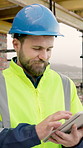 Architect, research and man with tablet in city, thinking or planning for home renovation on website. Civil engineer, scroll and happy person with tech, reflection and project management with info
