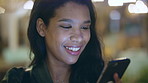 Happy woman, phone and texting at night in city with contact, online dating or taxi booking on travel. Girl, smile and check notification for transport, mobile app and social media post in urban town