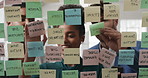 Business, people and sticky notes on glass in office for training, planning and schedule for accounting. Smile, team and goals in meeting for coaching, brainstorming and ideas for investment proposal