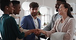Welcome, handshake and meeting with business people in office for merger, b2b or acquisition. Partnership, introduction and shaking hands with employees in agency for consolidation, deal or thank you
