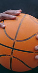 Basketball, closeup or hands on court with ball, leather material or training gear in sports session. Roundball, athlete or person with equipment, outdoor activity or grip texture in fitness hobby.
