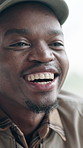 Black man, laughing and talking at cafe on date, friendly chat and discussion for interaction. Happy, male person and conversation at coffee shop for first impression, funny memory and communication