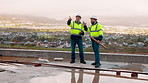 Walking, discussion and construction employees on site for city planning with building or repairs. Pointing, men and civil contractors in conversation with teamwork for maintenance in urban town.