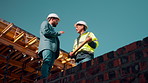 Men, architect and discussion with foreman for construction planning or management below. Low angle, male people or building supervisor talking with civil engineer for maintenance safety or security