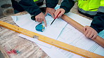 Hands, engineer and blueprint at construction site, discussion or project development with team. People, paperwork or floor plan for building design, industrial architecture or review drawing on desk