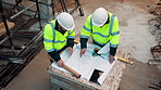 Architect, team and blueprint at construction site, planning and development feedback from above. People, paperwork and floor plan with discussion for building design, engineering and layout review