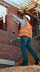Engineer, construction site and man for urban planning, thinking or decision for architecture. Inspection, insight and contractor with project management for civil engineering or building development