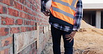 Construction, leg pain or man on site with walk, joint issue or labor injury in building project. Burnout, hurt or engineer with accident, muscle strain or limb sprain in infrastructure development.