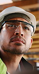 Construction, man and inspection with goggles on site for building progress, compliance and PPE. Protocol, safety manager and glasses for risk assessment, renovation project and development quality