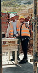 Construction, men or pointing with checklist on site for quality control, track progress or safety. Team, architect and project manager with clipboard for code compliance, inspection and development