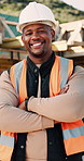 Architect, face and black man with confidence on construction site for building development. Portrait, male person or civil engineer with smile, hard hat or arms crossed for architecture or safety
