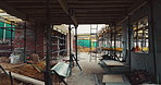 Construction, architecture or incomplete building at site for development, steel or engineering project. Brick wall, equipment or infrastructure, support structure or metal framework with ladder