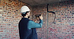 Photography, inspection and man with tablet at construction site, compliance or infrastructure review. Back, evaluation and person with tech screen for wiring, installation or electrical line picture