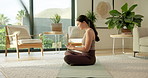 Woman, phone and texting with fitness in home on yoga mat with profile, smile or rest for wellness. Asian person, typing and notification with mobile app, social media or break for exercise at house