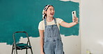 Woman, phone and home renovation for vlog, filming or recording with smile for painting. Interior design, house and Asian creator with live streaming, creative and social media app with talking