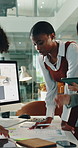 People, meeting and brainstorming in office with documents, data analysis and writing sales insights. Team, talk and paperwork in business with stats notes, tech or graphs for revenue growth strategy