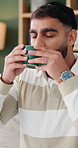 Man, coffee and drink in house with thinking for reflection, break or relax on lounge sofa. Person, eyes closed and perspective with beverage, caffeine or flavor on couch in living room of home