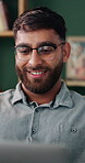 Laptop, freelancer or man with smile in home for online research, network or connection. Male person, designer or remote work with smile, glasses or computer for communication or information in house