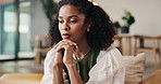 Worry, thinking and woman in home with stress, financial pressure or thoughts for bankruptcy crisis. Sad, pensive and person with anxiety in living room for debt, difficult decision and concern