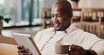 Smile, black man and remote work in home with tablet, research and proofreading for copywriting. Journalist, coffee and freelancer in lounge with digital app, editing article and story publication