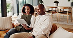 Travel, tablet or couple in house with plan, trip option or holiday selection on booking app. Discussion, tech or African people with connection, vacation itinerary or resort decision on tourism site