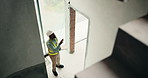 Above, black man and construction worker with tablet on site for feedback on renovation approval. Digital technology, planning and civil engineer with email for review on building or repairs.