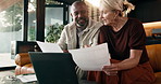 Documents, finance and laptop with interracial couple on sofa in home living room for planning. Budget, computer and paperwork with mature people in apartment for financial discussion or review