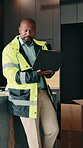 Thinking, black man and engineer at new house with laptop, research or ideas for architecture. Mature person, inspection or pc for evaluation, quality control and information for property development