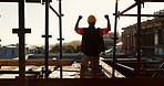 Engineer, man and fist pump with hardhat for construction, good news and gratitude for project success. Back, person and cheering with helmet for victory, celebration and achievement of architecture