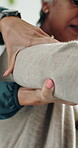 Hands, physiotherapist and old woman with shoulder pain, assessment and check for wellness at clinic. People, injury and muscle strain with inspection for symptoms, healthcare service and support