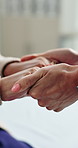 Holding hands, nurse and old woman with support, counseling and recovery for wellness at clinic. People, medical professional and connection for healing, healthcare services and rehabilitation