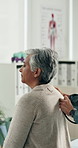 Hands, physiotherapy and old woman with stethoscope, back or check breathing at wellness clinic. People, medical professional and listen to lungs with inspection, healthcare or service at hospital