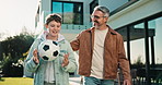 Ball, happy and dad with child in backyard for bonding, healthy relationship and development. Family, house and father with son for connection, talking and playing with football together on weekend
