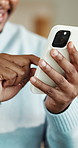 Phone, scrolling and hands of man in home with texting, chatting or social media on mobile app. Technology, typing and male person with cellphone for communication or email on website in apartment.