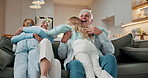 Excited, children and hug with grandparents in home for care, support or connection with generations. Girl, run and embrace with senior people in living room for family bonding, love and reunion