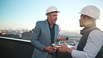Construction, planning and tablet with people on rooftop for city architecture or project management. App, conversation and hardhat with men outdoor for property, real estate or urban development
