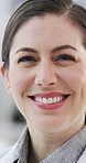 Scientist, face and woman with smile in lab, innovation and confident for pharmaceutical development. Happy, medical professional and person with pride, science and healthcare breakthrough in clinic