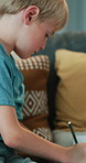 Drawing, writing and children in home for learning, motor skills and development for creativity. Siblings, house and kids with paper, notebook and stationery for homework, assignment and education