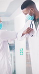 Doctors greeting, elbow and mask for covid compliance with confused meeting, handshake and policy in clinic. Man, woman and safety with respect, kindness and welcome with chat and hygiene protocols