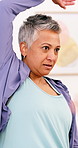 Physiotherapy, health or mature woman stretching in office for arm injury recovery or rehabilitation. Physical therapy, person or patient with chiropractor for wellness, healthcare or medical healing