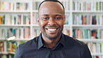 Creative, face and man with smile in library, knowledge and pride for publishing career development. Happy, literary agent and black person with talent representation job, confident and opportunity