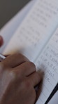 Wellness, hands and writing in journal with self care, emotions and feelings for personal growth. Person, daily reflection or notes in diary for goal setting, plan or stress relief for mental clarity